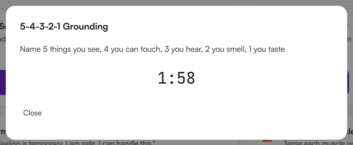 Exercise dialog for 5-4-3-2-1 Grounding with its description, a countdown timer at 1:58 and a Close link