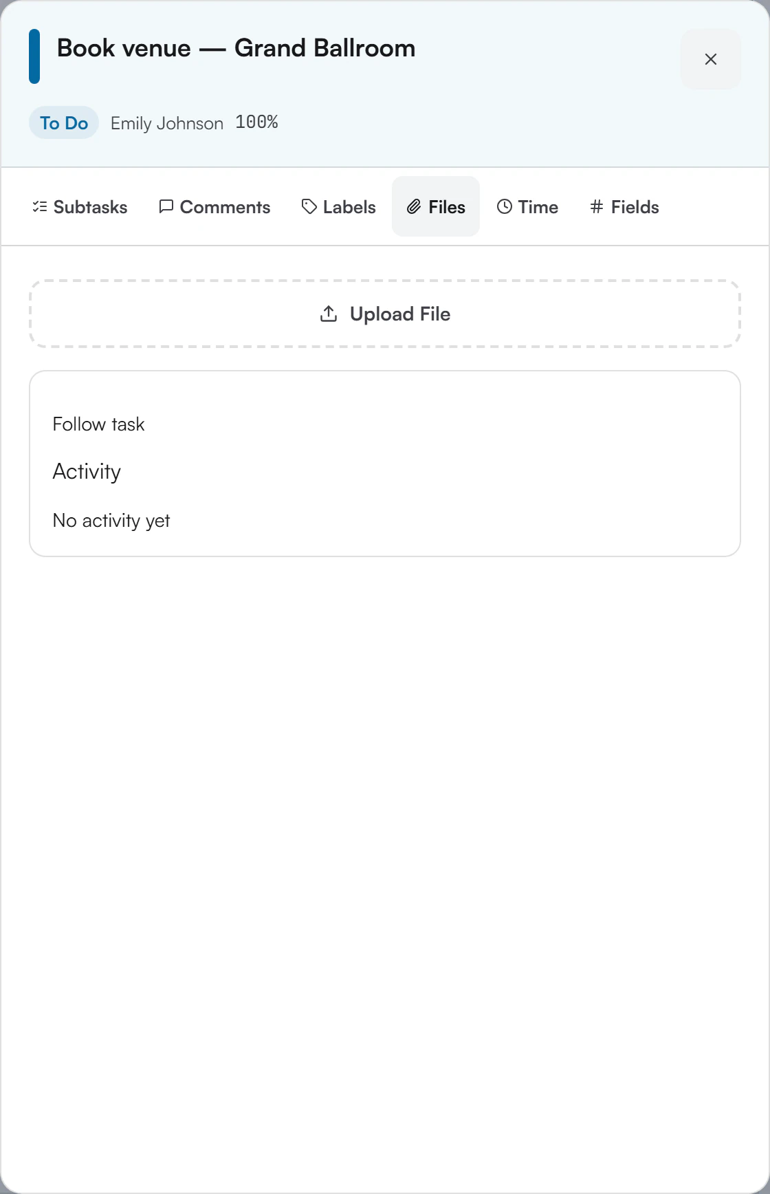 Task Detail Panel on the Files tab, showing a dashed Upload File area